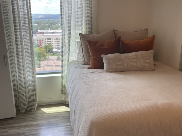 Cute apartment bedroom with view