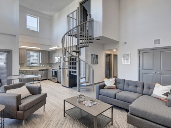 Apartment living area with spiral staircase